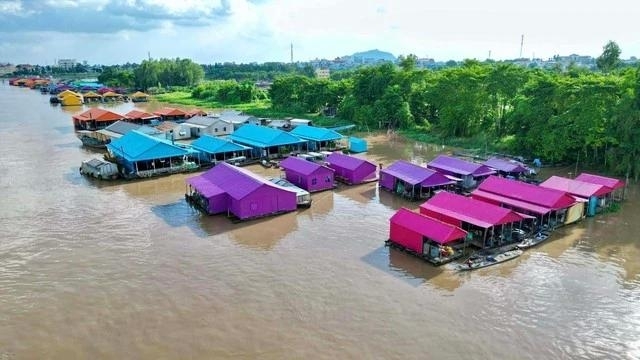 Unique colorful raft village at confluence of Chau Doc River